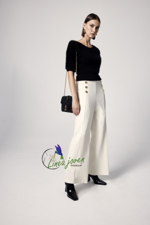 Pantalón blanco botones...